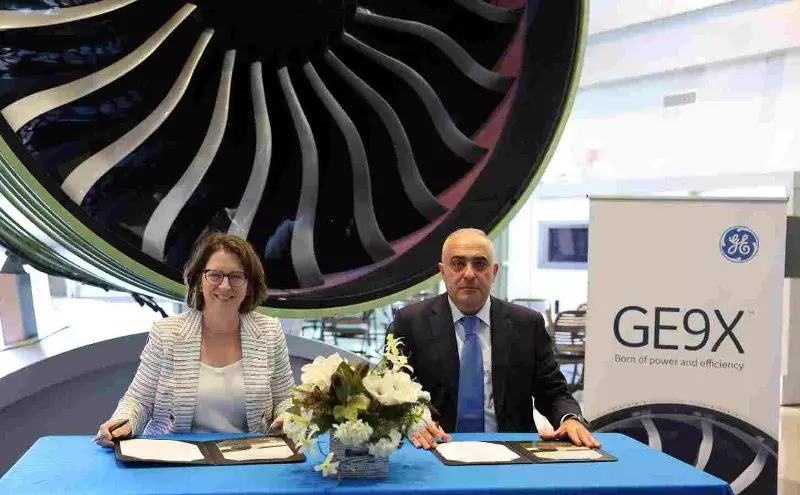 Kathy Mackenzie GE Aerospace and Zaur Akhundov Silk Way Group Kathy Mackenzie GE Aerospace and Zaur Akhundov Silk Way Group
