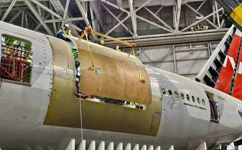 Mammoth & Aspire MRO install main cargo door on 777-300ERMF Mammoth & Aspire MRO install main cargo door on 777-300ERMF