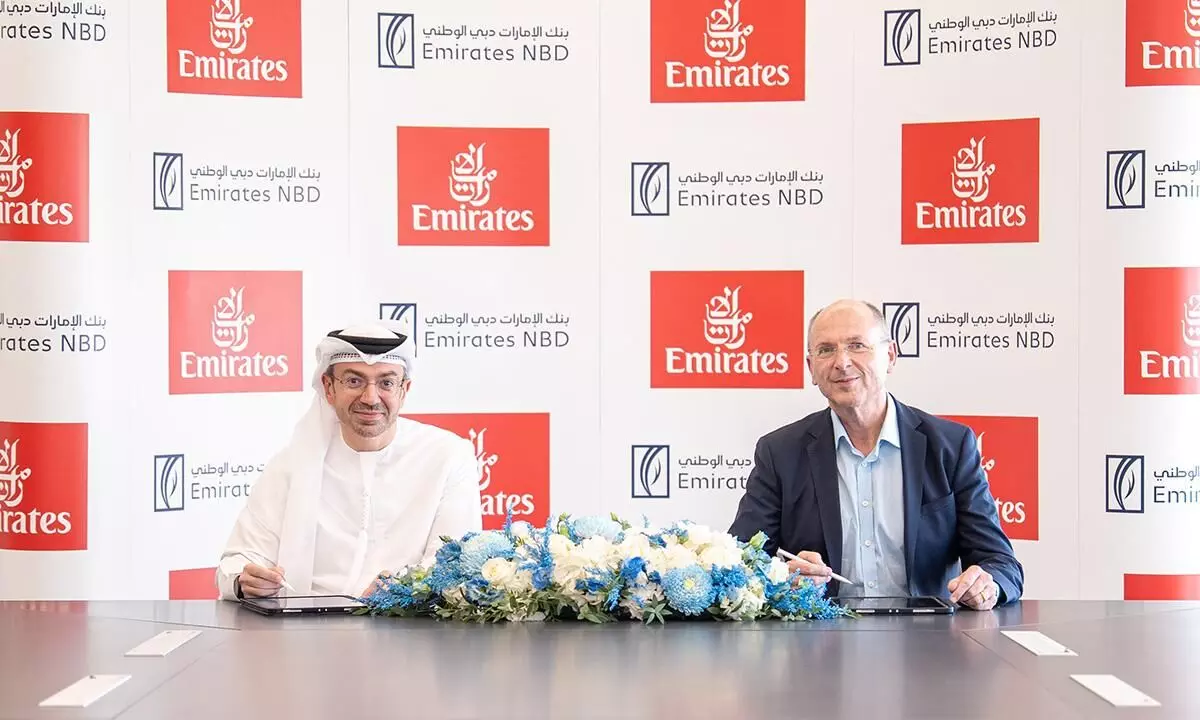 Emirates NBD signs $350M Boeing 777F financing with Emirates Emirates NBD signs $350M Boeing 777F financing with Emirates