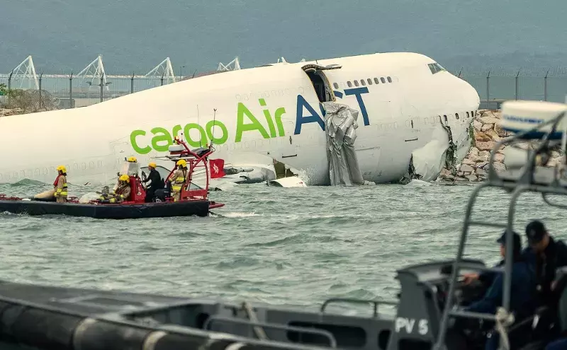 AirACT B747F crashes off Hong Kong runway; two ground staff killed AirACT B747F crashes off Hong Kong runway; two ground staff killed