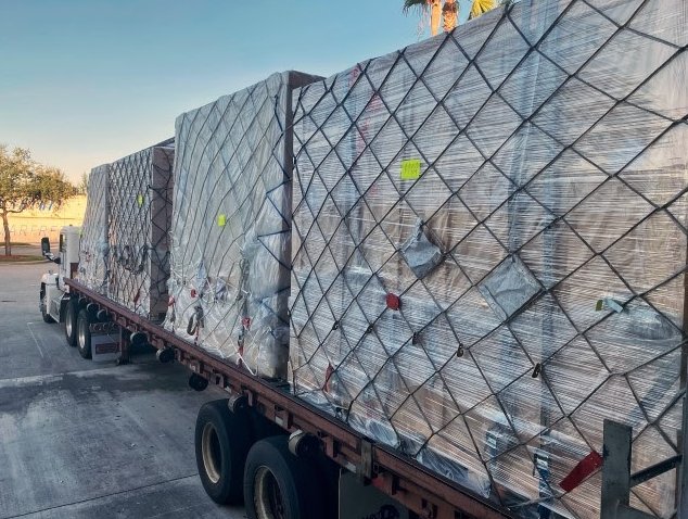 The valuable artworks get moved by truck from the airport. Air Cargo