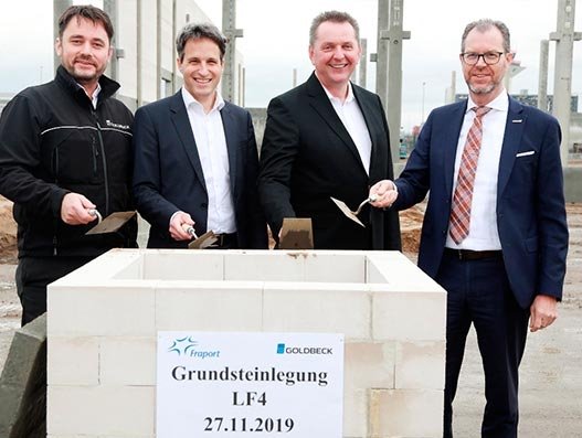 (L-R) Mike Flörke, division manager at Goldbeck; Felix Kreutel, senior vice president of real estate and properties at Fraport AG; Karl-Heinz-Dietrich, senior executive vice president retail and properties at Fraport AG; Willy Ruf, senior vice president central &amp; eastern Europe at Swissport during the ceremony for laying the foundation stone for Swissport Air Cargo Warehouse at Frankfurt Airport’s CargoCity South.  Air Cargo