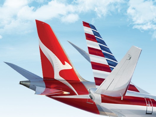 American and Qantas to form joint business; file application with the US DOT