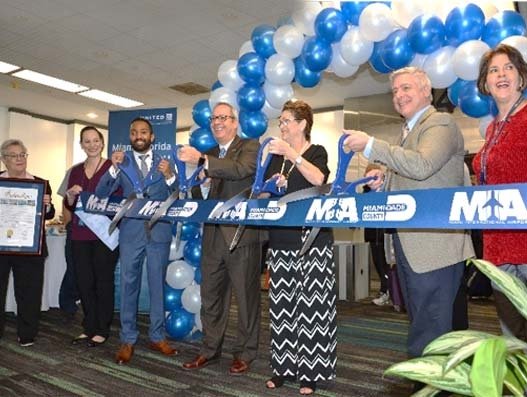 Miami-Dade County Board of County Commissioners vice chairwoman Rebeca Sosa (center) joined MIA director and CEO Lester Sola and officials from United Airlines to present a County proclamation and celebrate the airline’s 60th anniversary at MIA. Aviation